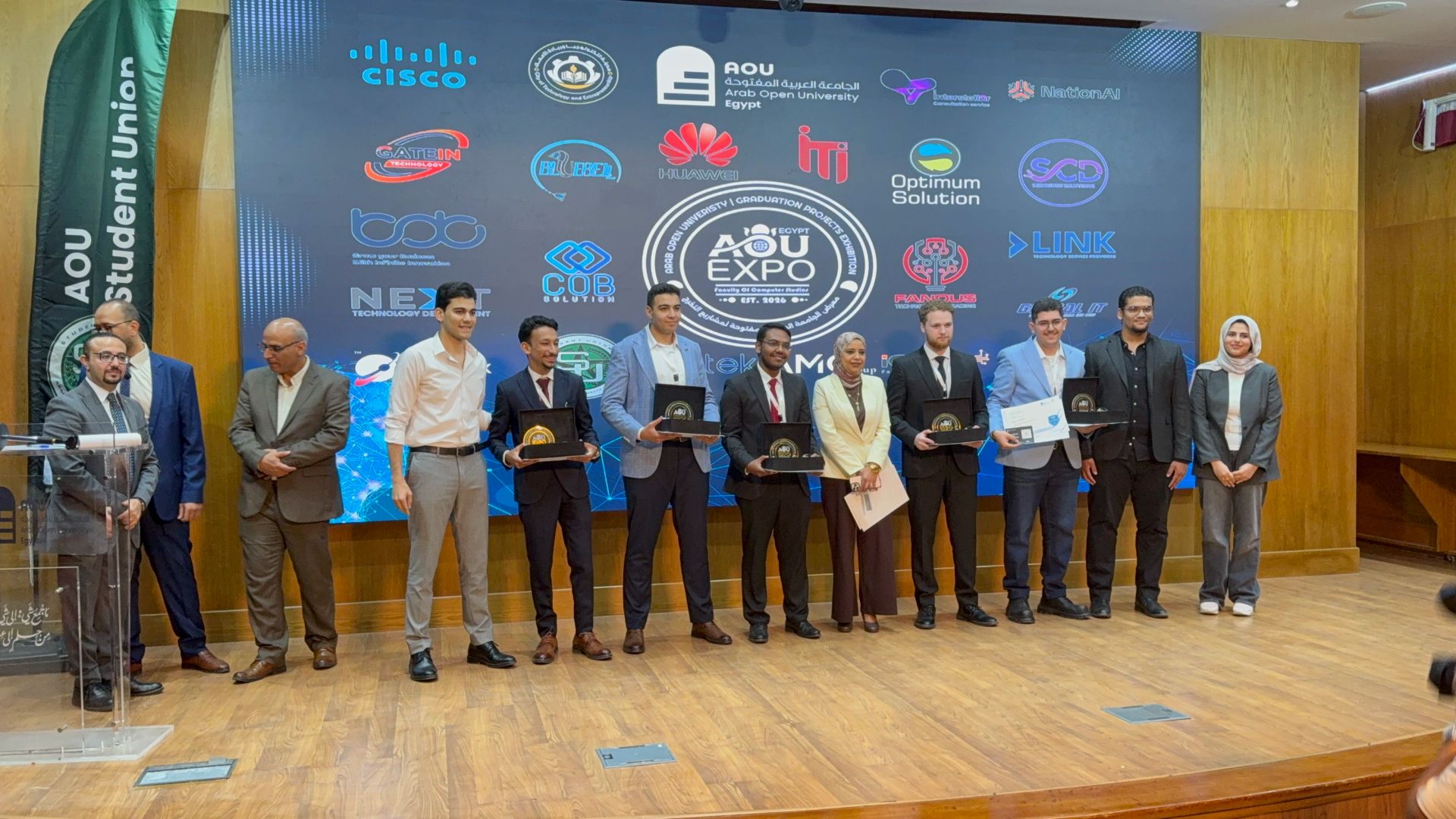 AOU Expo 2026: Honoring students on stage all students in one photo