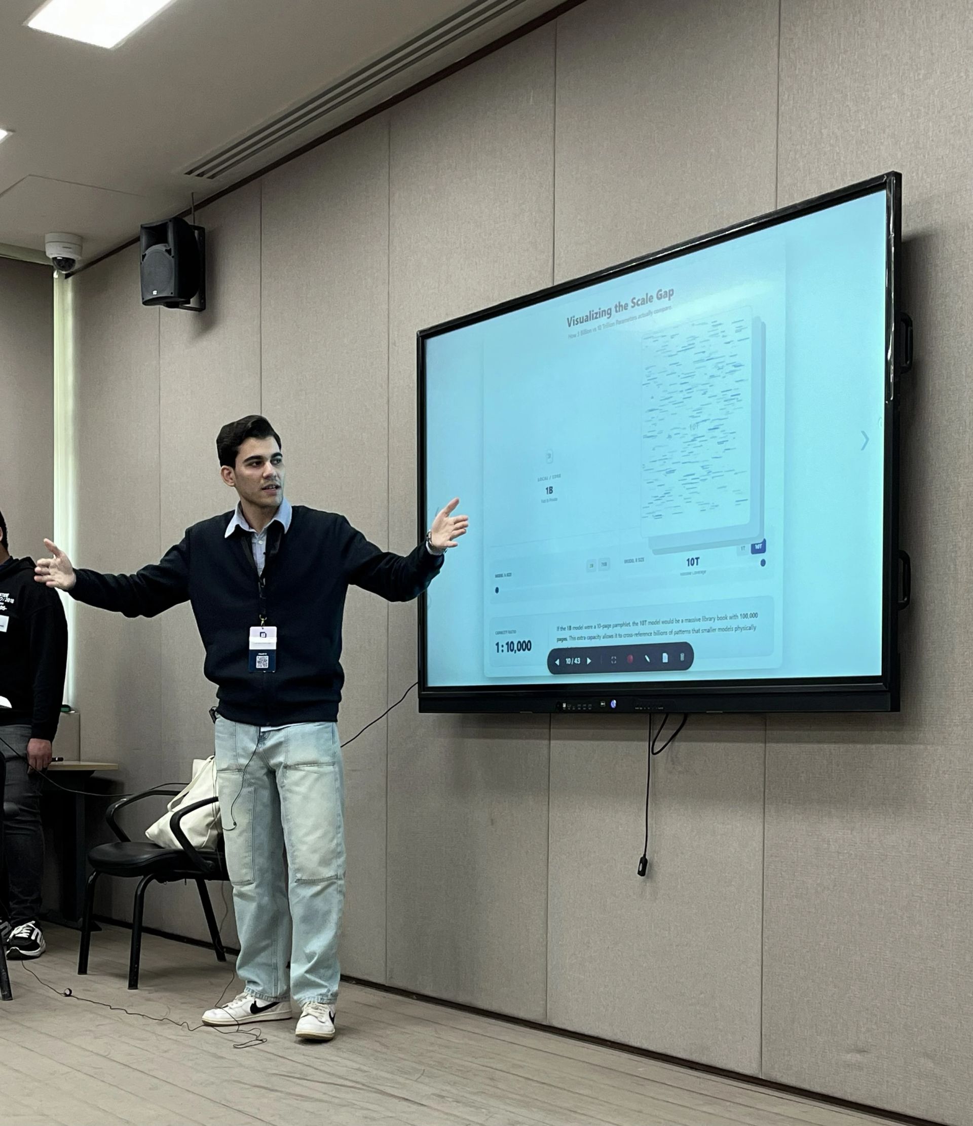 Introduction to Large Language Models: Moaz explaining in the board