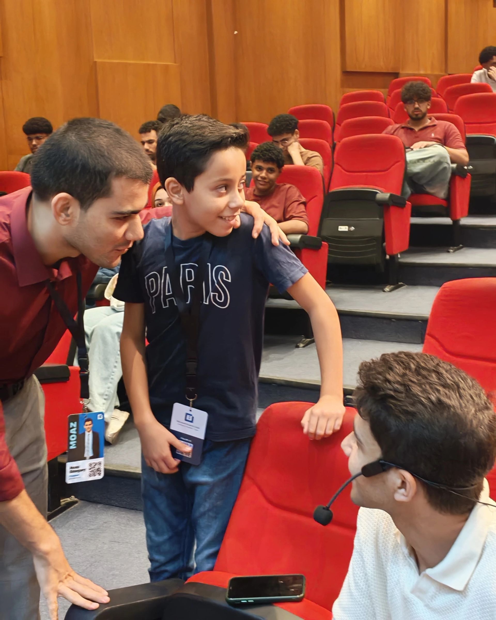 LLM Engineering Bootcamp: From Foundations to Deployment: Moaz talking with a speaker